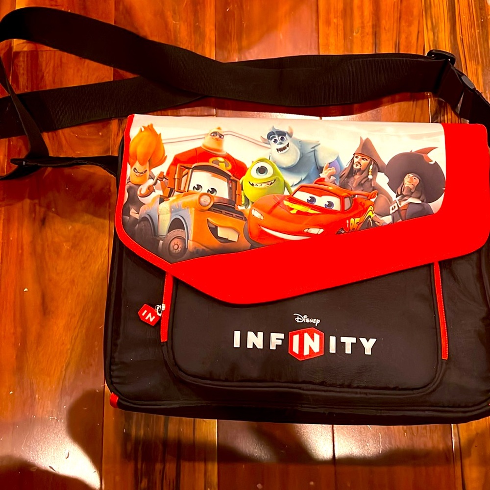 Disney Infinity Bundle! Carrying bag, display case and gaming pieces as shown
